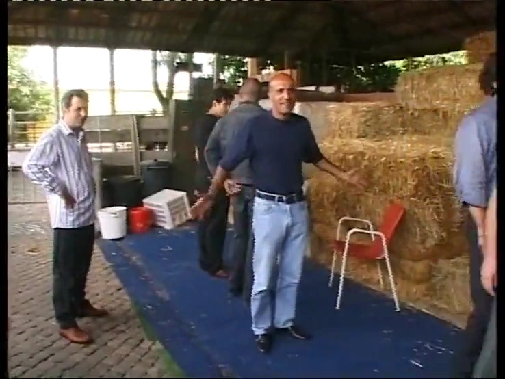 Horny group of men takes advantage of an innocent blonde in a barn porn video